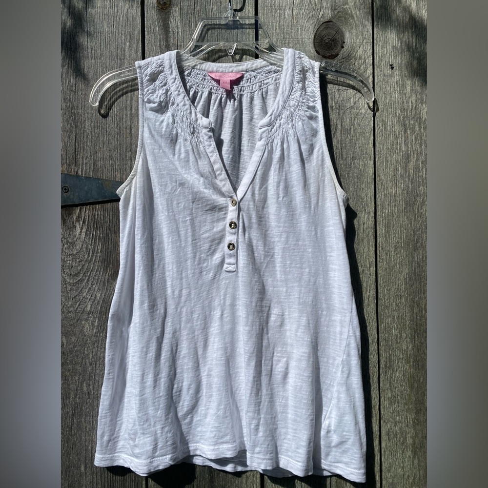 Lilly Pulitzer white sleeveless with gold buttons.
